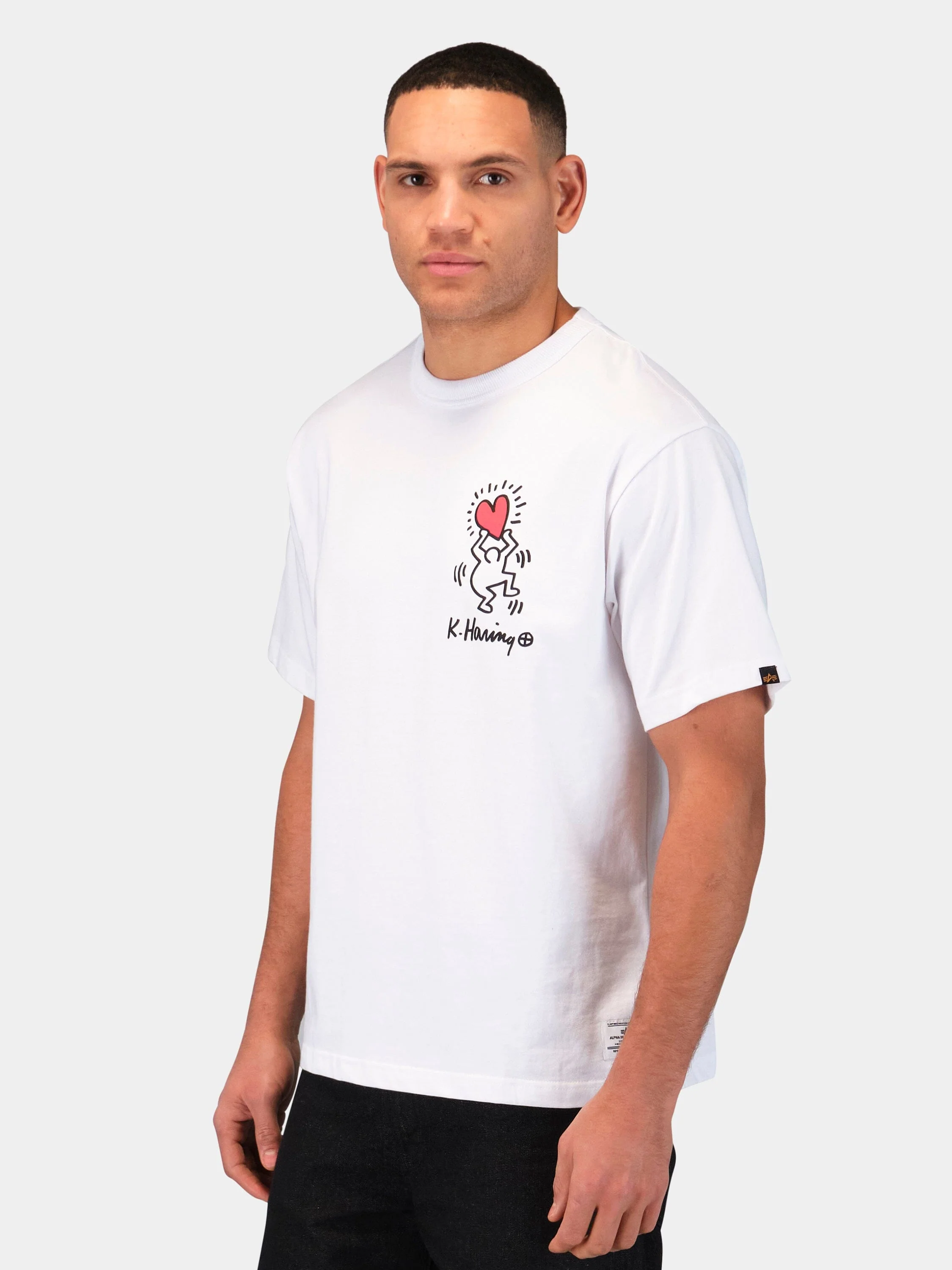 KEITH HARING X ALPHA GRAPHIC TEE "HEART MAN" - Image 11